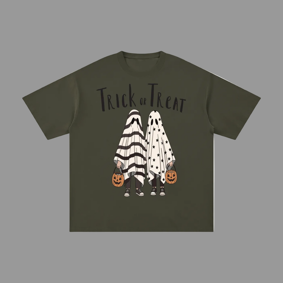 An olive green short-sleeve t-shirt with a 'Trick or Treat' Halloween graphic on the front, featuring two ghost characters in black-and-white and white polka-dot costumes holding jack-o'-lanterns, shown against a plain gray background.