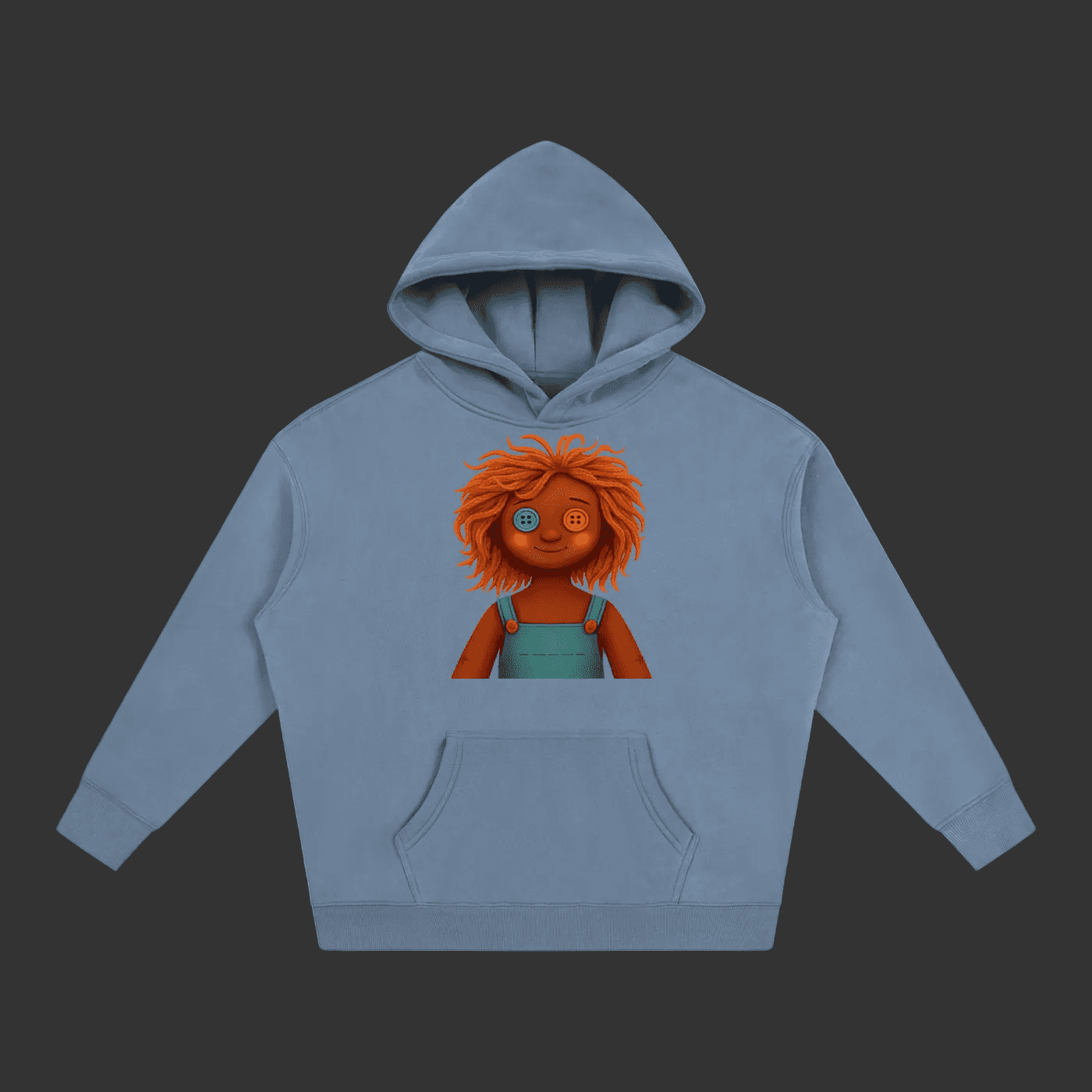 A dusty blue pullover hoodie featuring a graphic print of a doll with orange hair and a teal top on the front, displayed against a solid gray background.