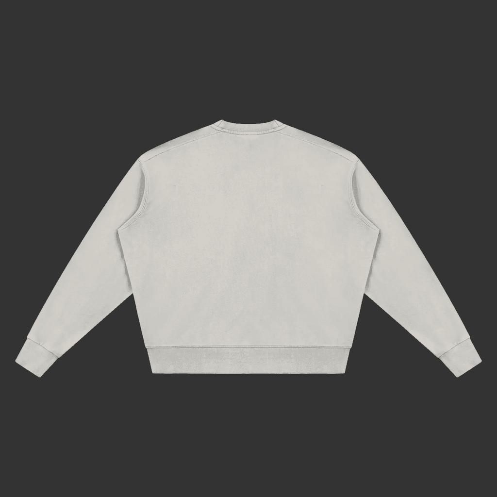 A light gray crewneck sweatshirt shown from the back, laid flat against a dark gray background.