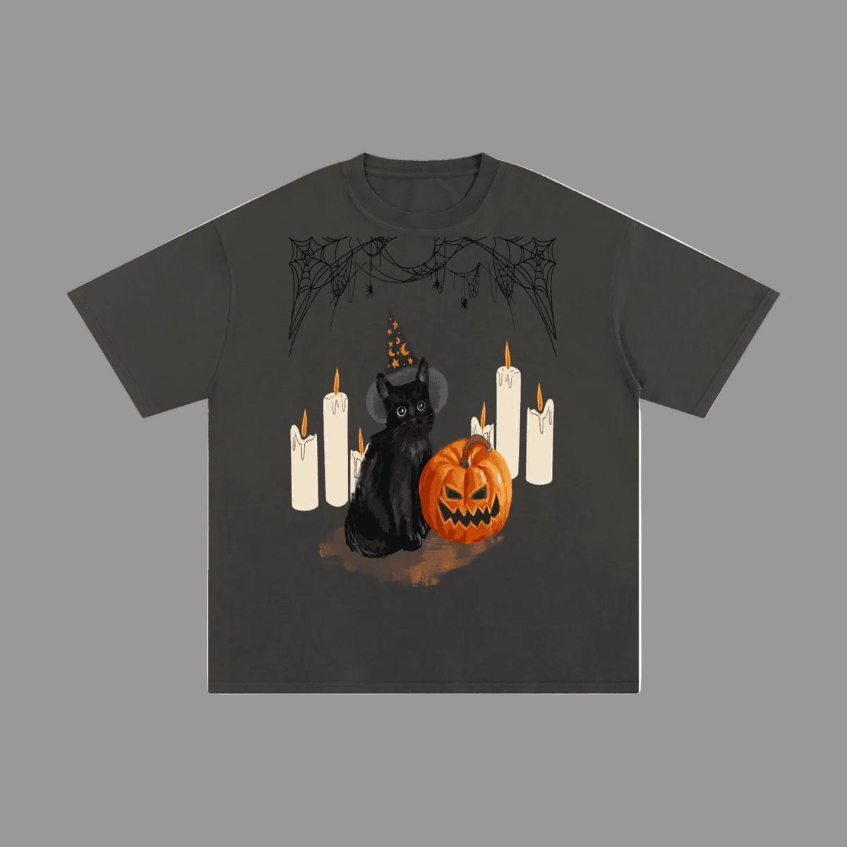 A dark charcoal gray short-sleeve t-shirt with a Halloween graphic print featuring a black cat in a witch hat, a carved orange pumpkin, and white candles.
