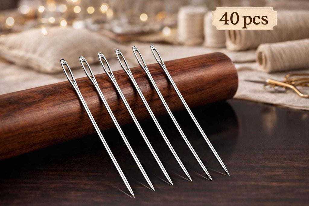 Large-eye hand sewing needles stored in a wooden needle case for easy threading and sewing projects