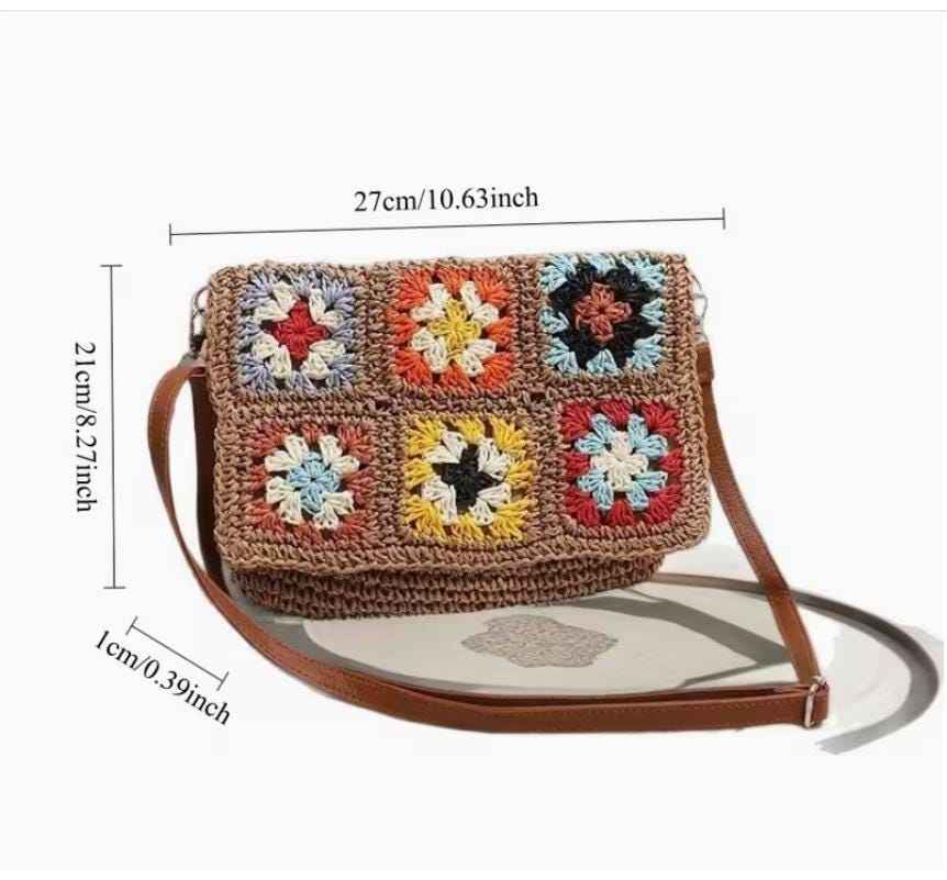 Vintage granny square crochet purse with adjustable shoulder strap and product dimensions displayed