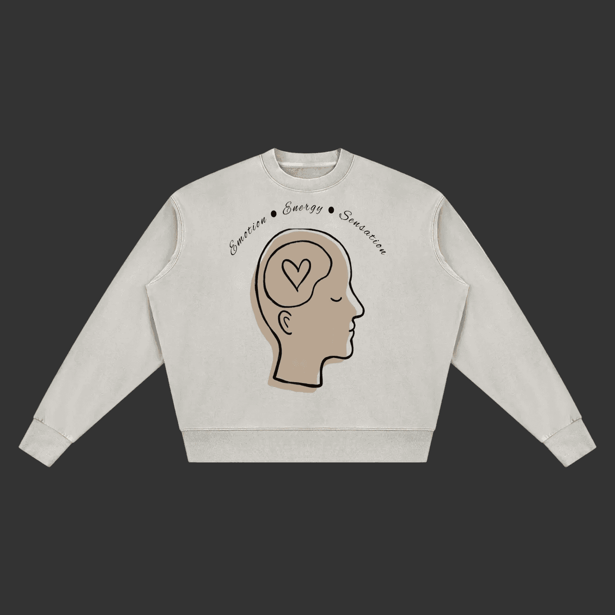 A light beige crewneck sweatshirt featuring a graphic of a side-profile human head with a heart inside the brain, with the words 'Sensation • Energy • Simulation' written above, shown on a plain gray background.