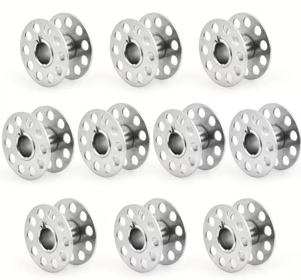 Silver metal sewing machine bobbins compatible with household sewing machines and embroidery projects