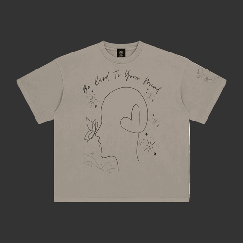 A light gray short-sleeve t-shirt with a black line art graphic of a profile silhouette, a heart, and the text 'We Kind To Your Friend' on the front, displayed flat against a gray background.