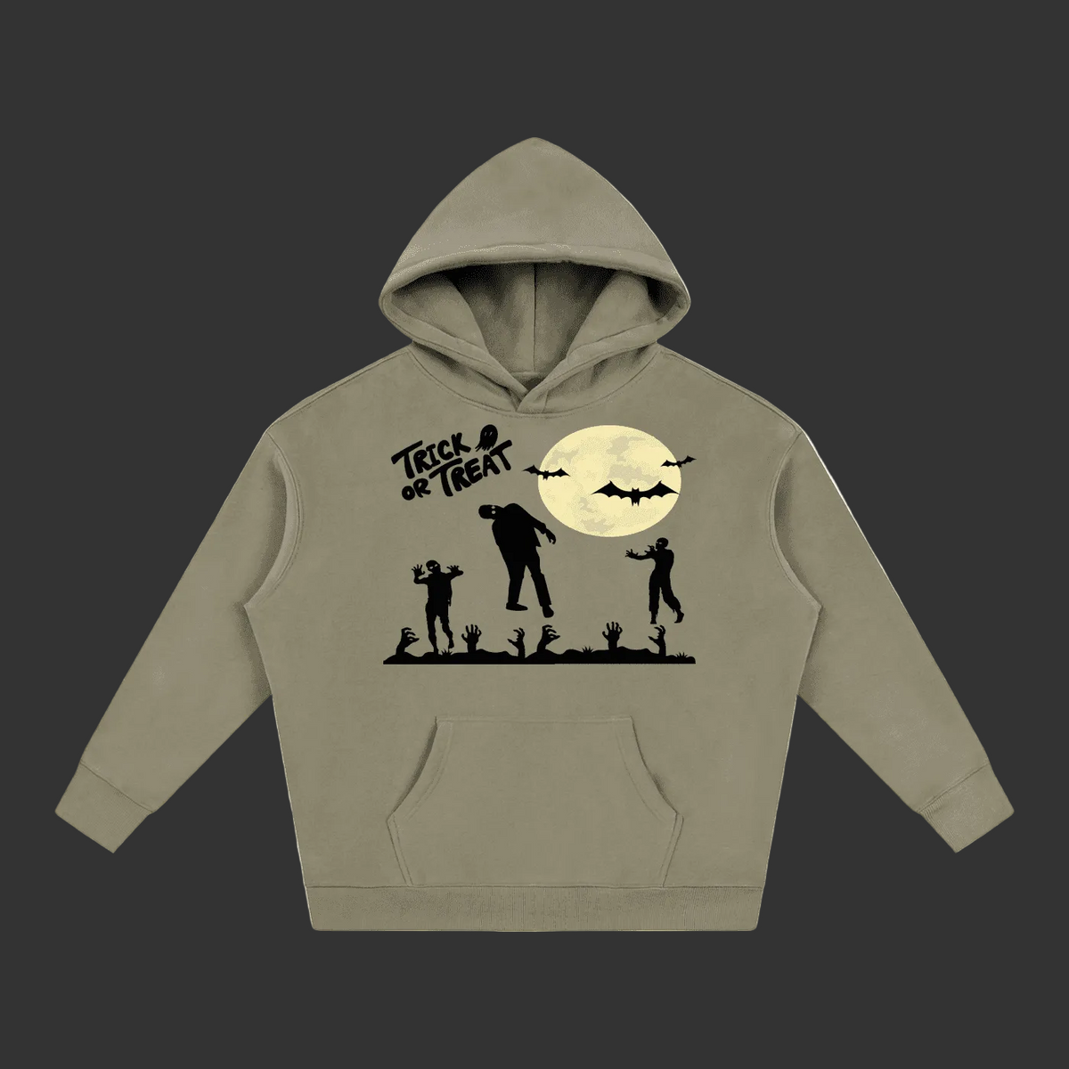 A grayish green unisex pullover hoodie featuring a black and cream-colored Halloween graphic on the front, including a witch on a broomstick, bats, a full moon, pumpkins, and a spooky town silhouette