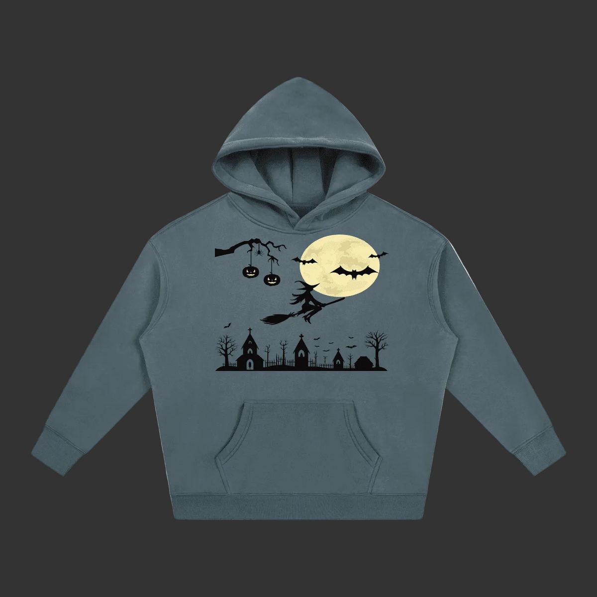 A slate blue-gray hoodie featuring a black and yellow Halloween graphic print on the front, including a full moon, bats, a witch on a broomstick, pumpkins, and a spooky town silhouette.