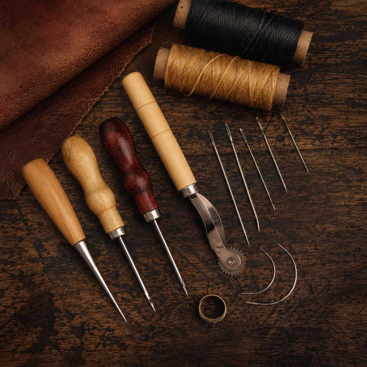 DIY leather sewing kit with stitching awls, hand sewing needles, waxed thread, and leather repair tools