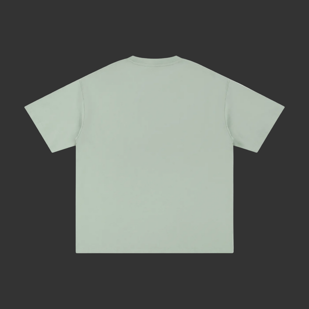 A sage green short-sleeve t-shirt shown from the back, laid flat against a solid gray background.