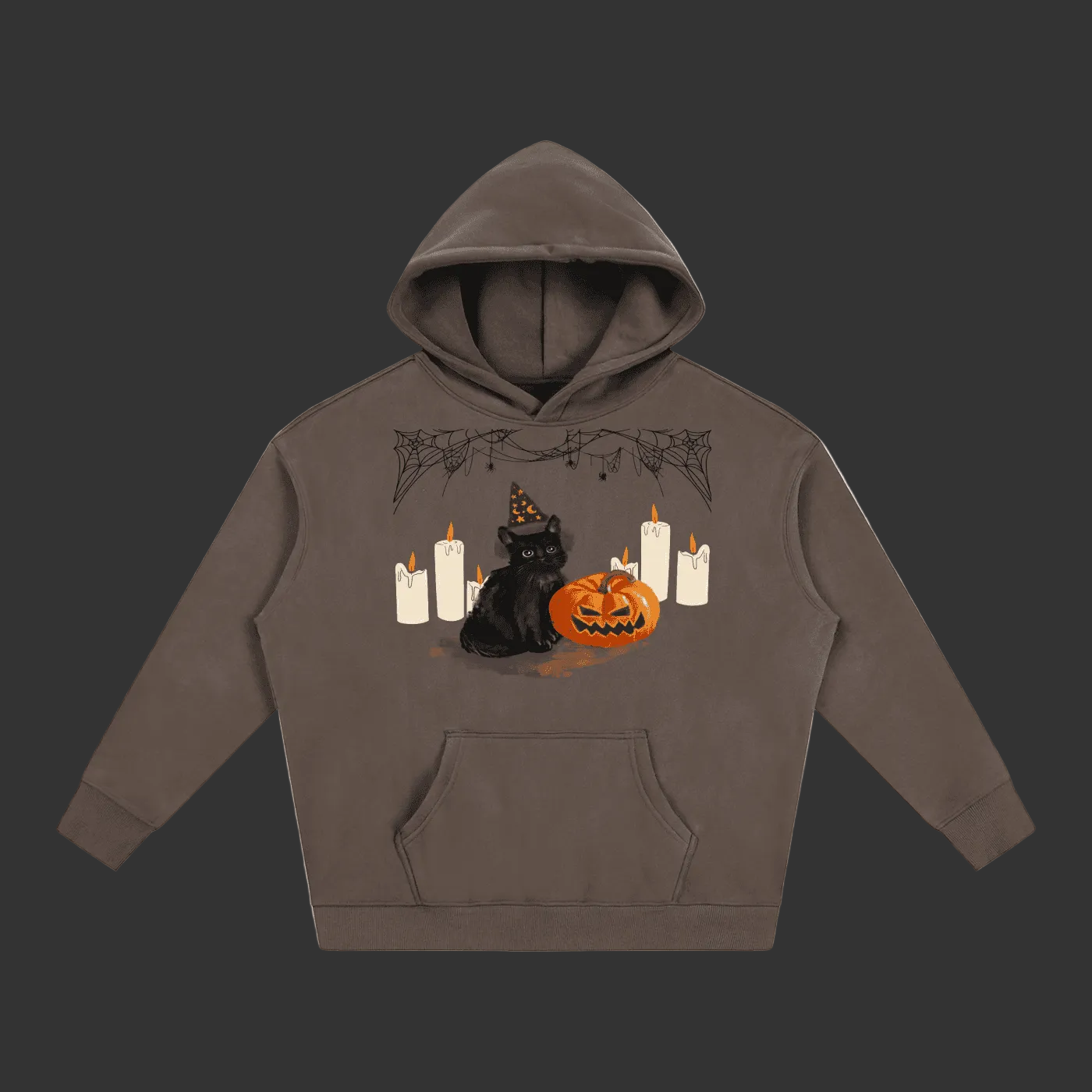 A dark brown pullover hoodie featuring a Halloween graphic of a black cat wearing a witch hat next to a carved orange pumpkin, surrounded by white candles and spiderwebs, shown on a plain gray background.