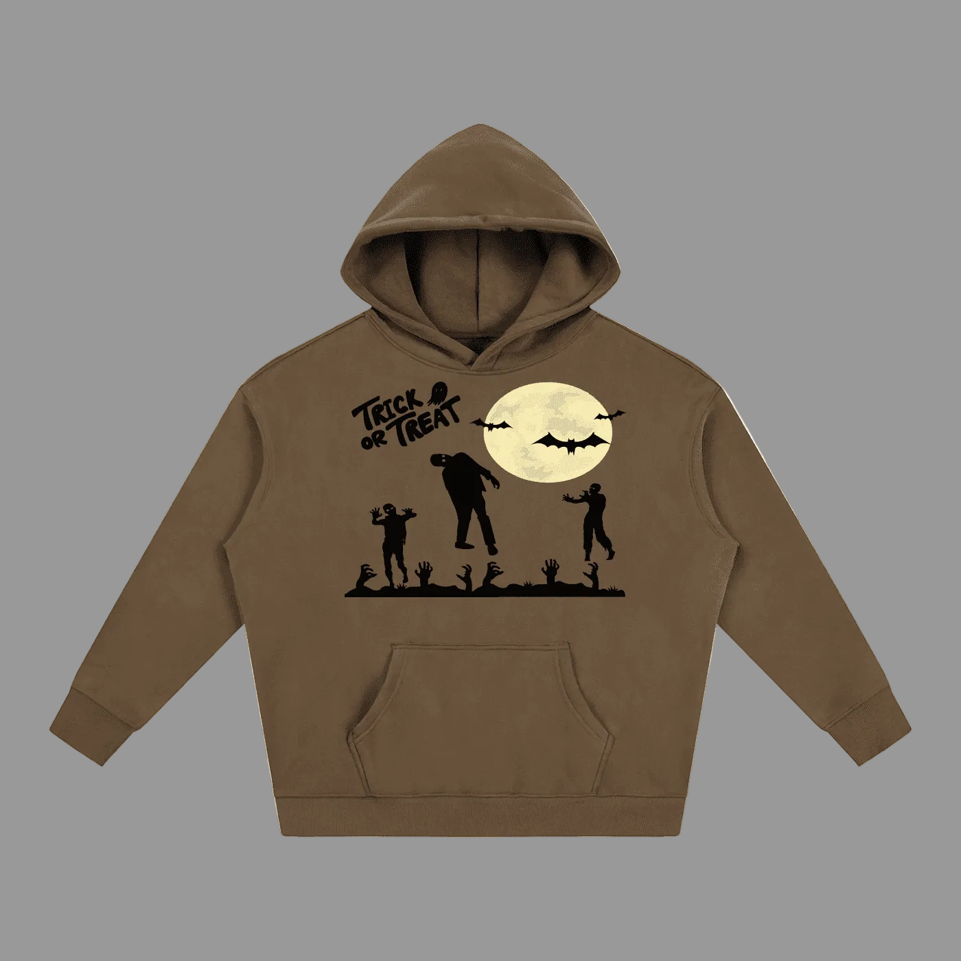 A brown pullover hoodie with a black graphic of a full moon, bats, silhouettes of children and a zombie, and the text 'Treat or Treat' on the chest, shown against a plain gray background.
