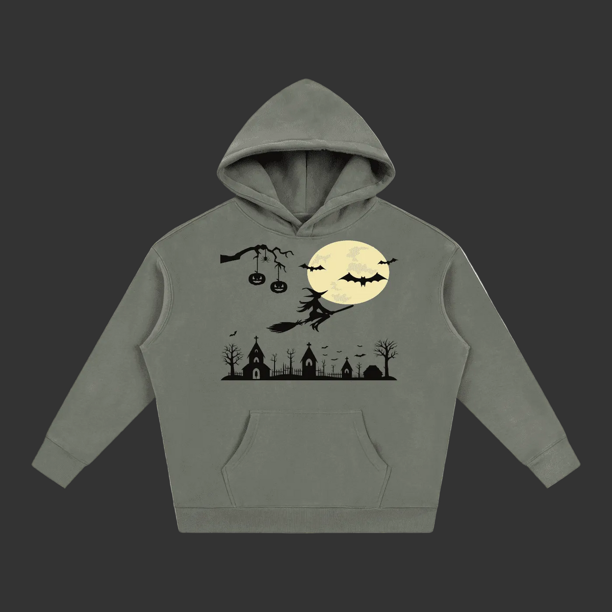 A gray pullover hoodie featuring a black and cream-colored Halloween graphic on the front, including a witch on a broomstick, bats, a full moon, pumpkins, and a spooky town silhouette