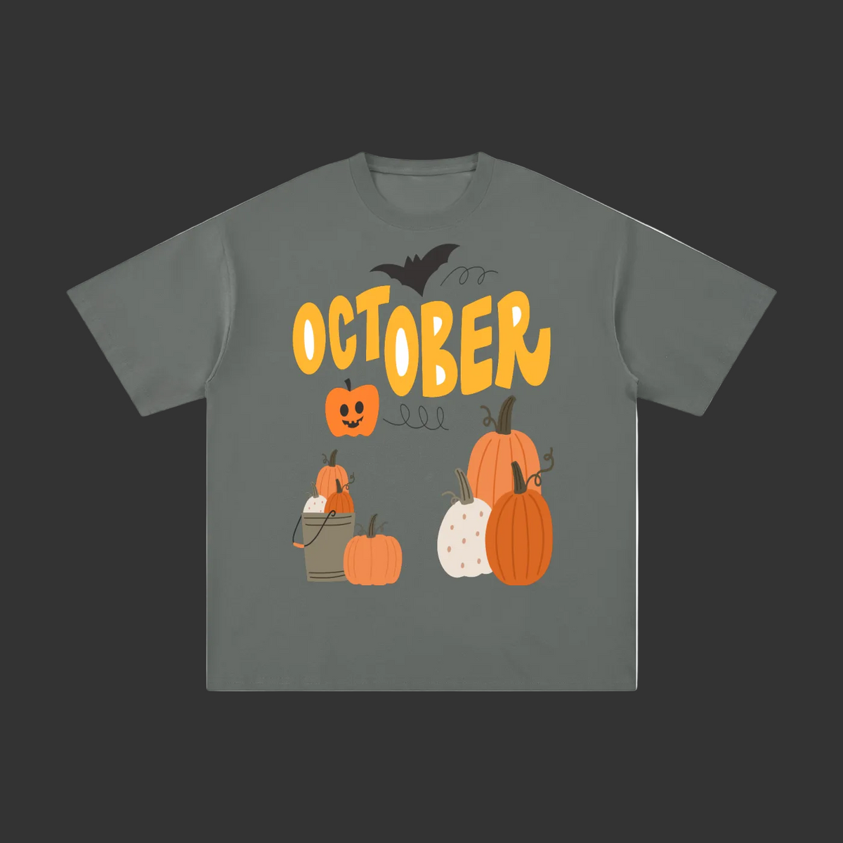 A dark gray short-sleeve t-shirt with a Halloween graphic on the front featuring the word 'OCTOBER' in yellow, pumpkins, a jack-o'-lantern, a spider, and a bat.