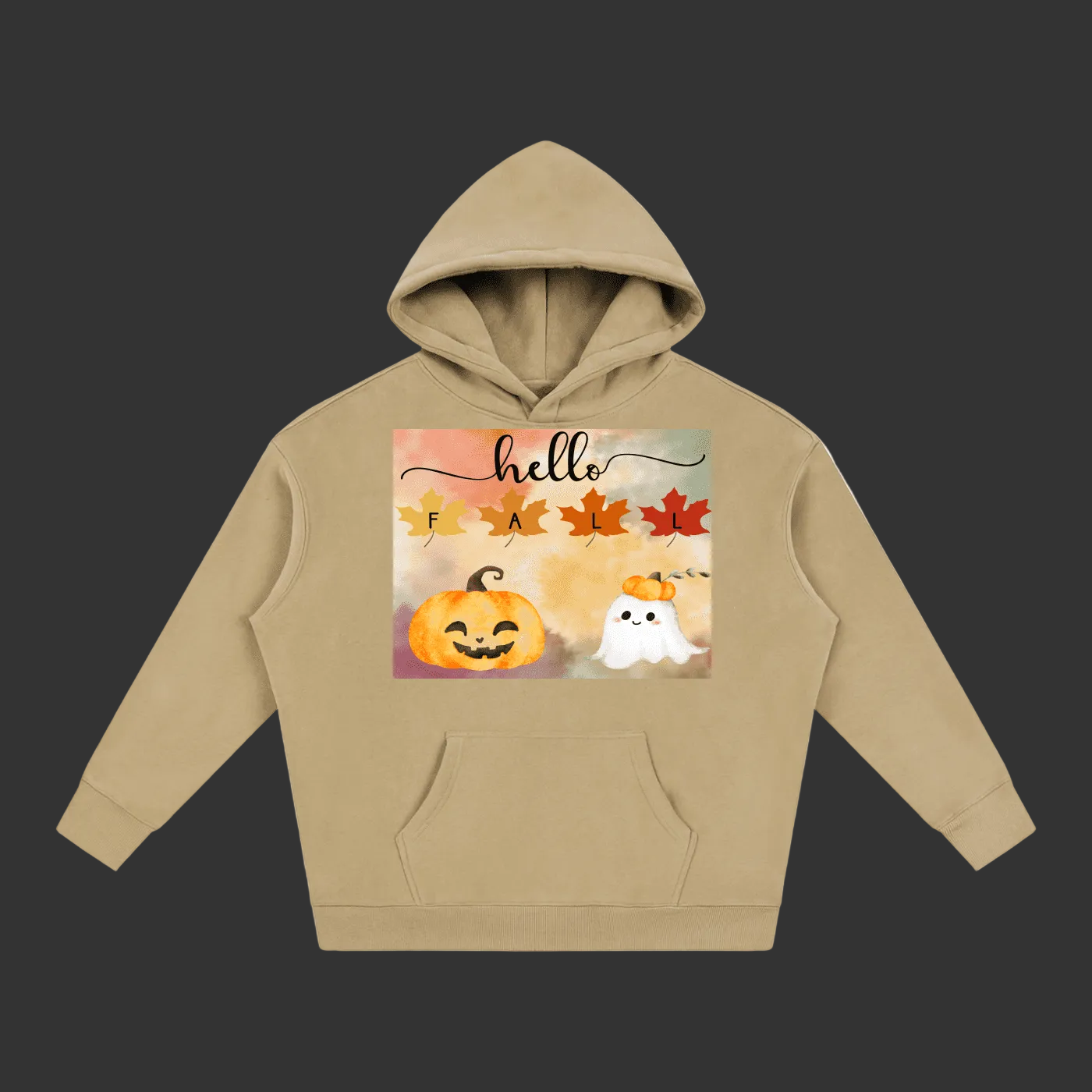 A tan pullover hoodie with a front graphic featuring a smiling jack-o'-lantern, a white cartoon ghost, autumn leaves, and the text 'hello FALL'.