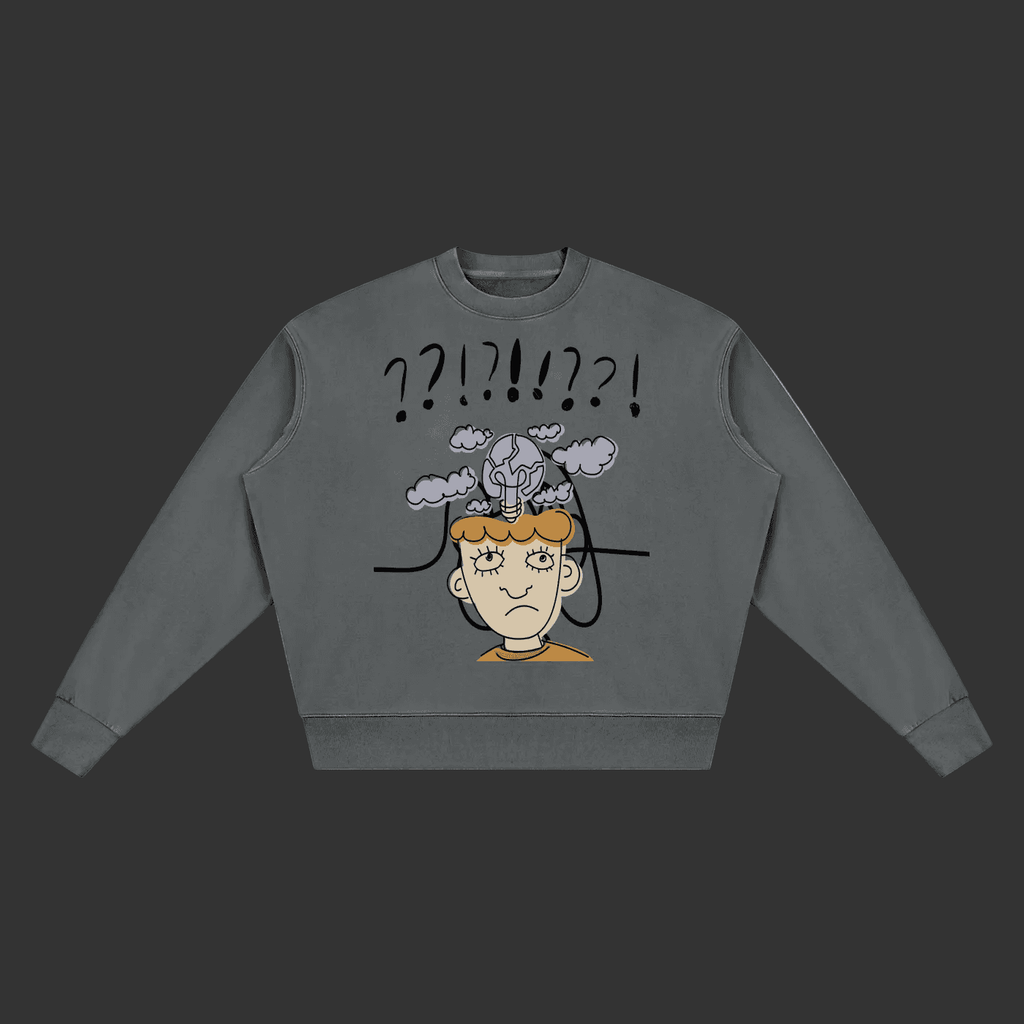 A dark gray crewneck sweatshirt featuring a cartoon graphic of a confused person with an exploding head and question marks above, displayed on a clean gray background.