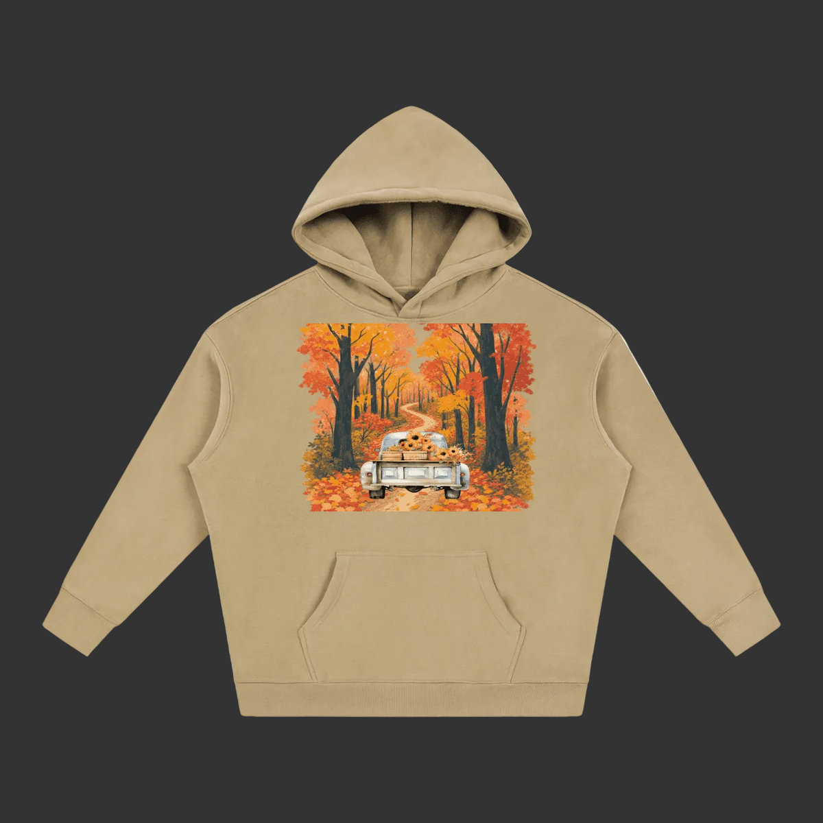 A beige pullover hoodie with a front kangaroo pocket and a central graphic print of a vintage car driving down an autumn forest road