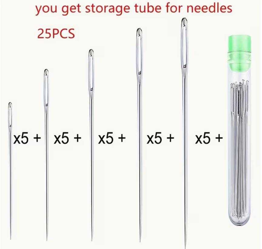 Set of leather sewing needles in assorted sizes with protective storage tube for upholstery and leather repair
