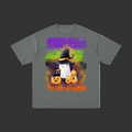 A dark gray short-sleeve t-shirt with a colorful graphic print of a white ghost in a witch hat surrounded by three jack-o'-lantern pumpkins, set against a plain gray background.