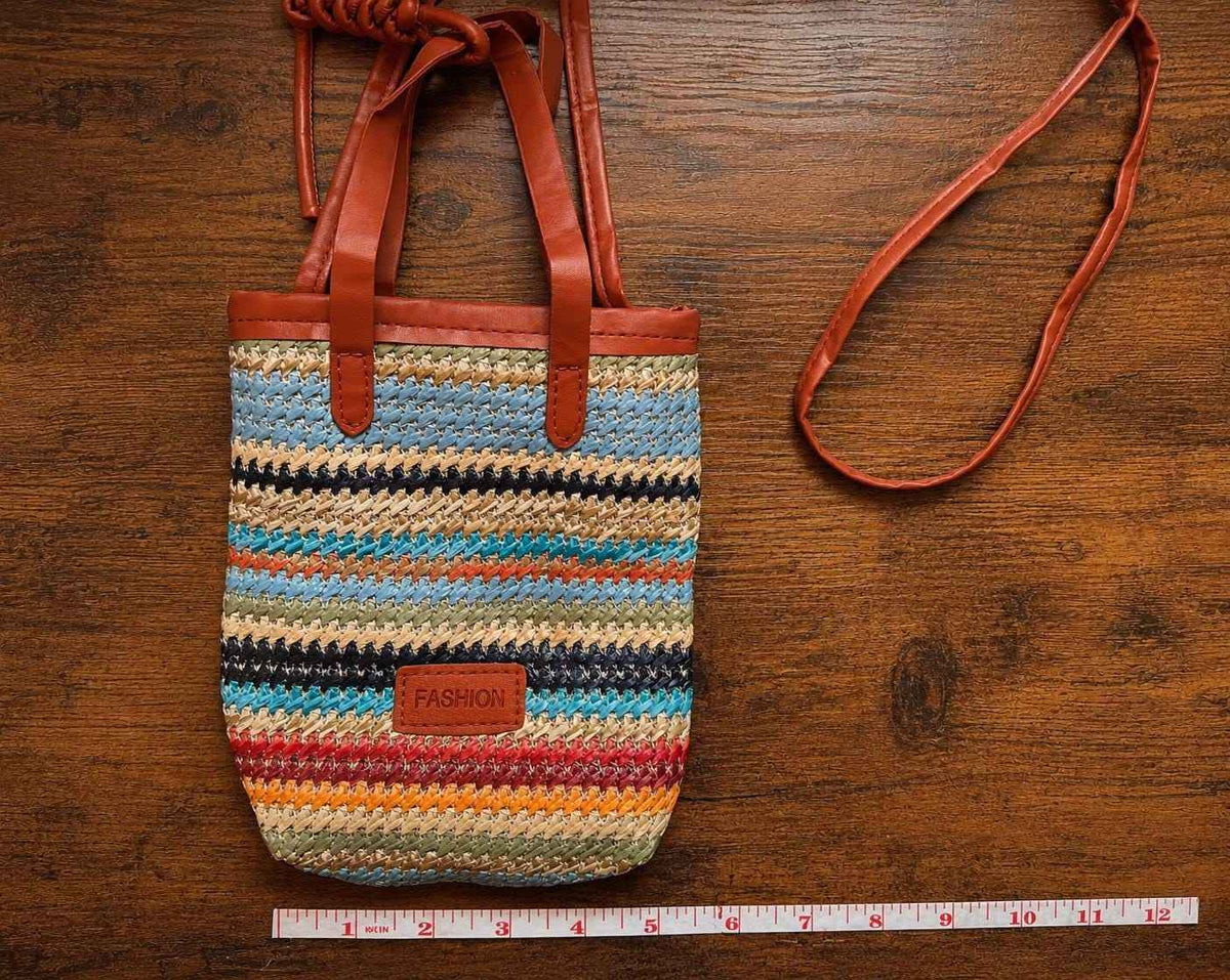 Colorful woven summer crossbody bag with leather straps and a 'FASHION' label