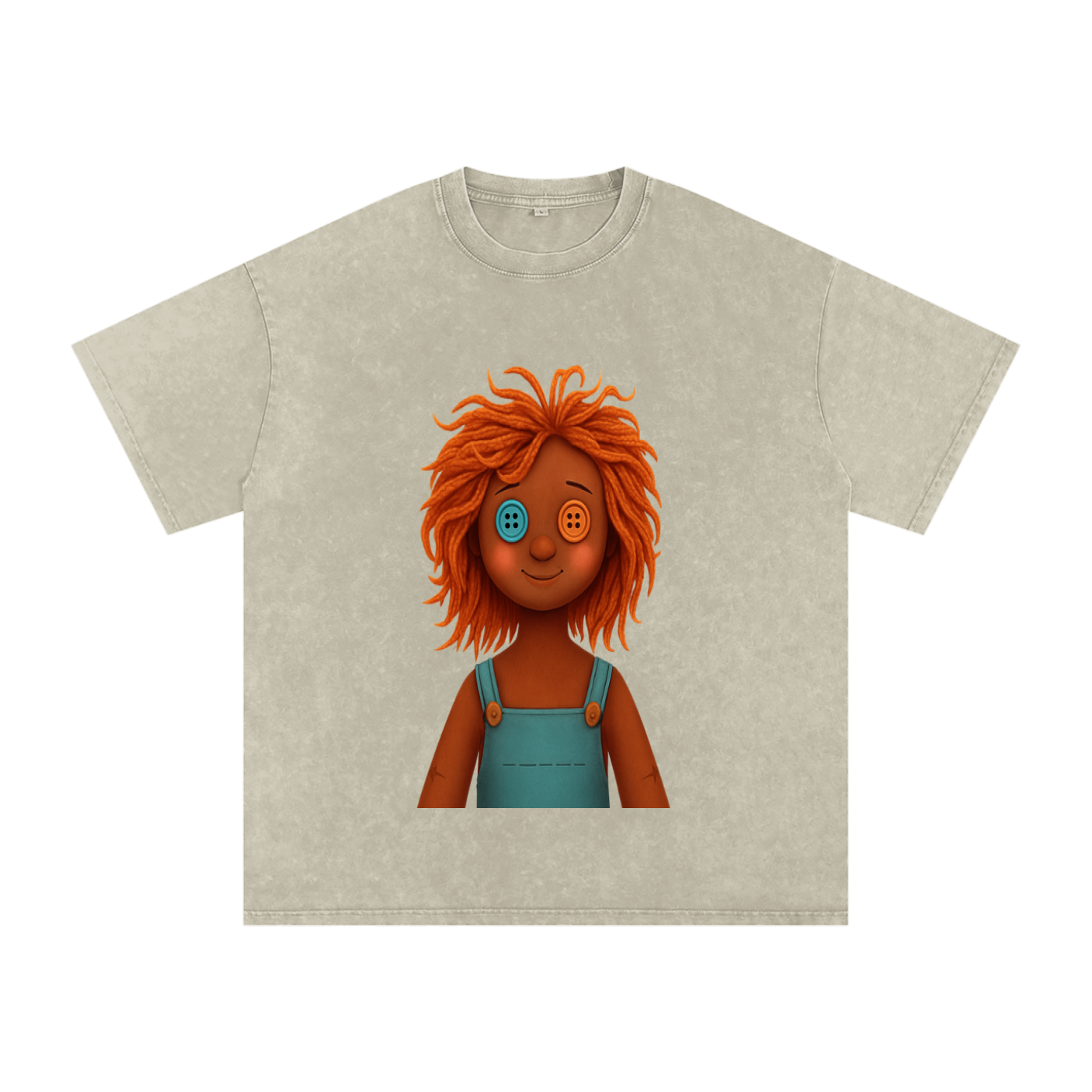 A khaki ash short-sleeve t-shirt with a graphic print of a doll character with orange hair, one blue button eye, and one orange button eye, wearing teal overalls.