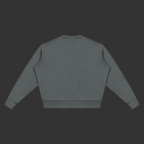 A dark gray crewneck sweatshirt shown from the back, laid flat against a solid gray background.