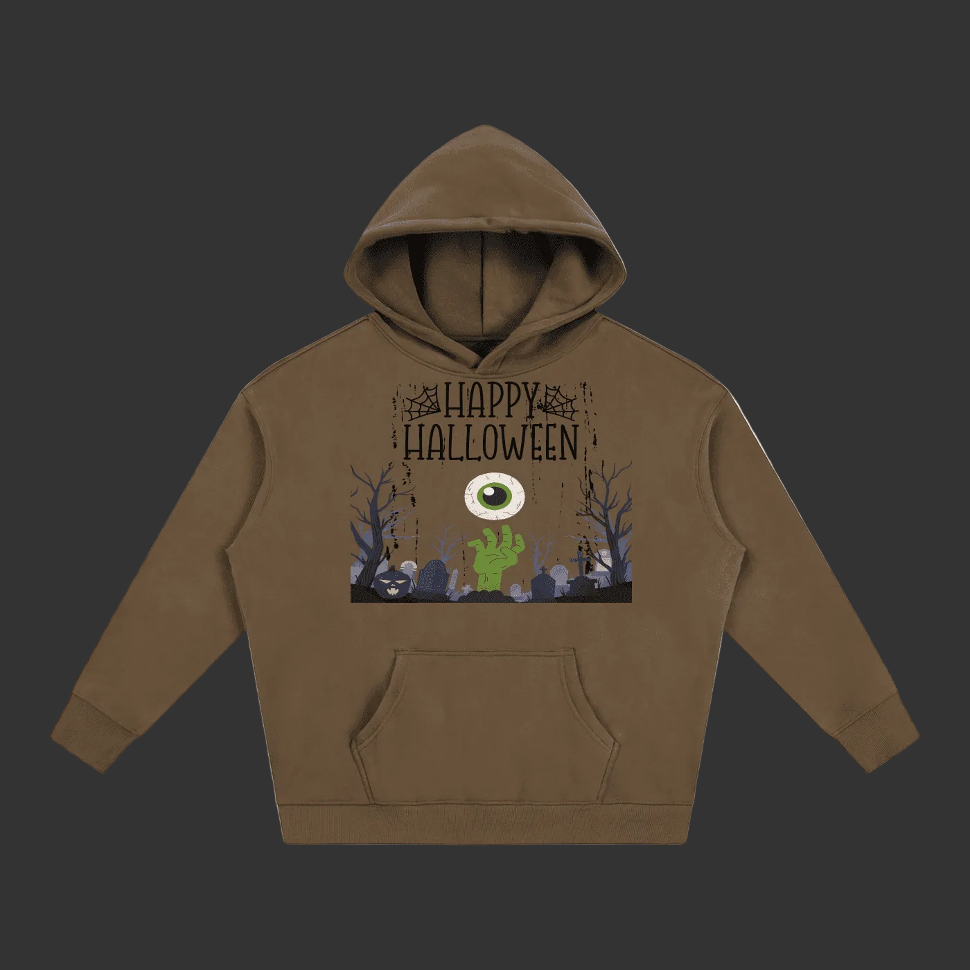 A brown pullover hoodie with a Halloween graphic on the chest, featuring the text 'Happy Halloween' above a spooky scene with a large eye, green hand, and bare trees, shown on a plain grey background.