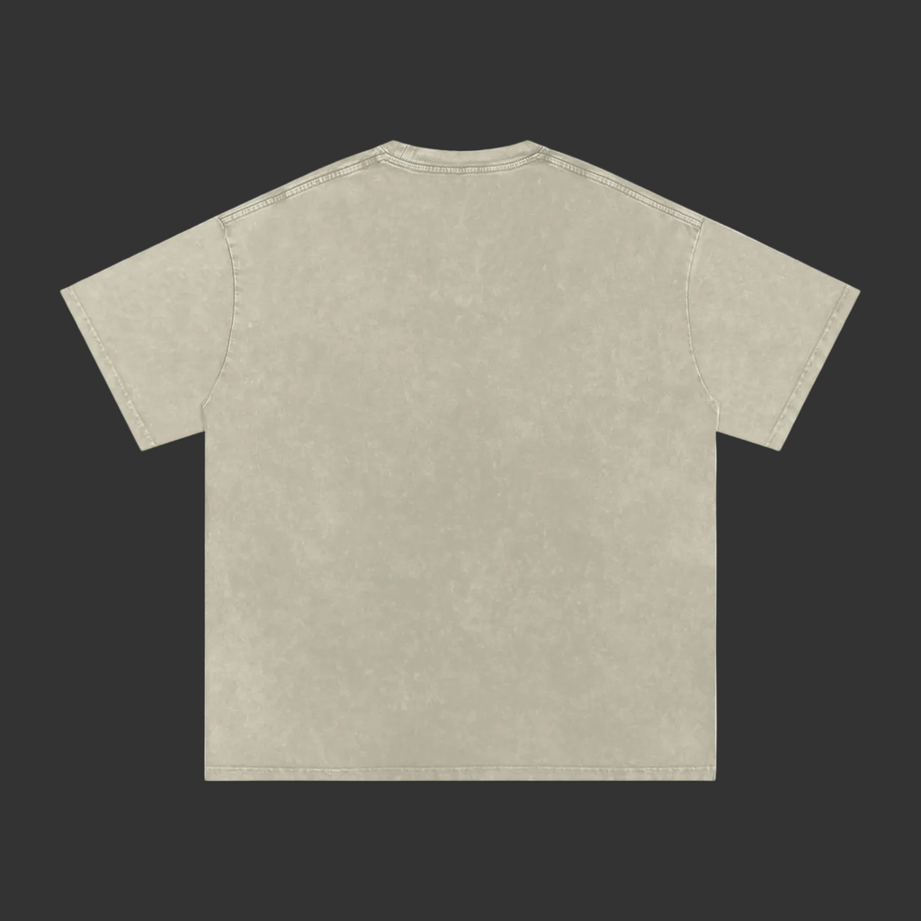 A short-sleeve crewneck t-shirt shown from the back, featuring a washed, mineral-washed finish in a light beige or sand color, displayed on a solid gray background.