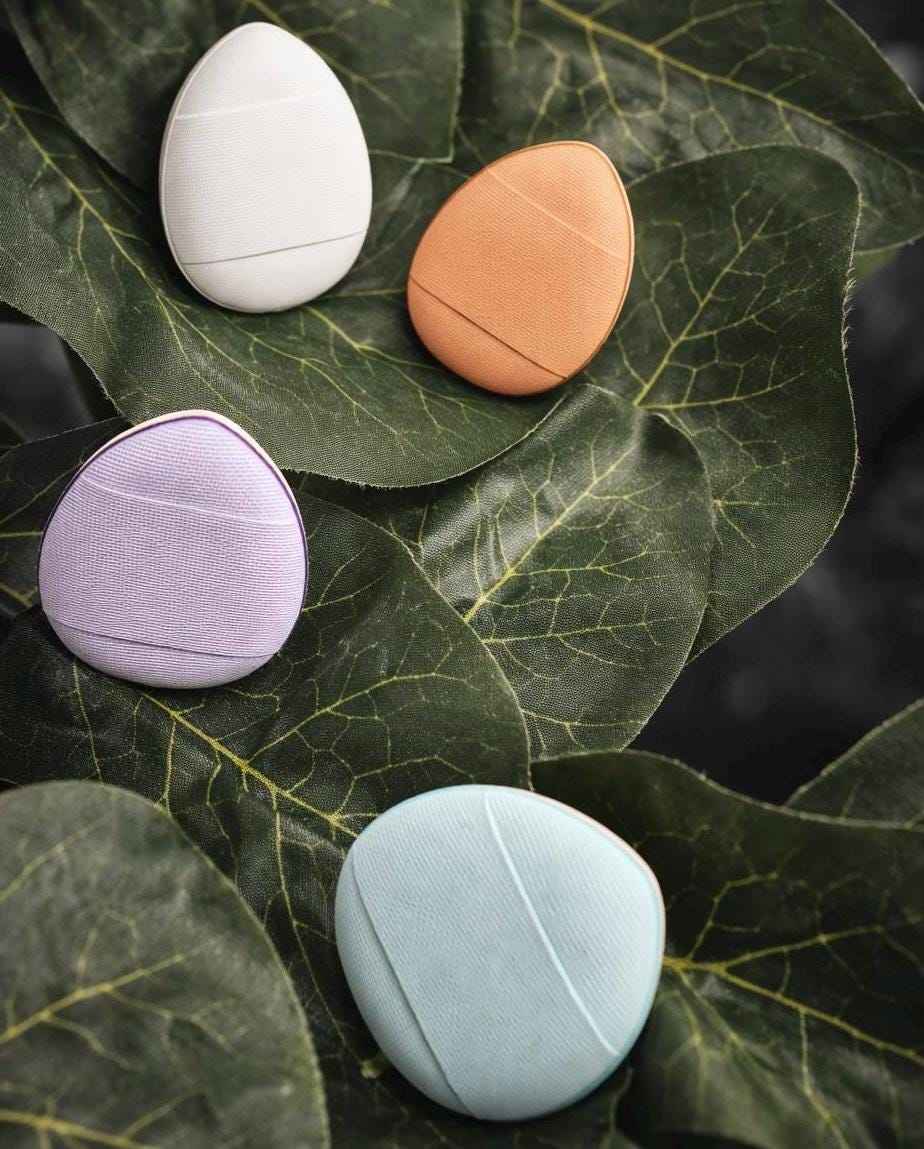 Colorful mini finger makeup sponges for detailed makeup application around eyes, nose, lips, and hard-to-reach areas