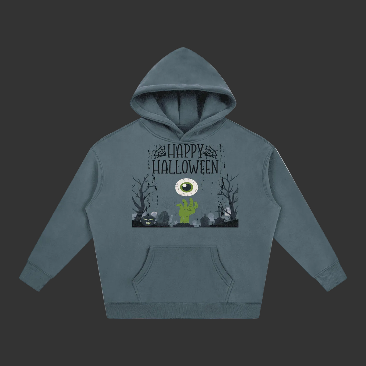 A slate blue-gray hoodie featuring a 'Happy Halloween' graphic print on the chest with a green zombie hand, a large eye, and spooky trees, shown on a plain grey background.