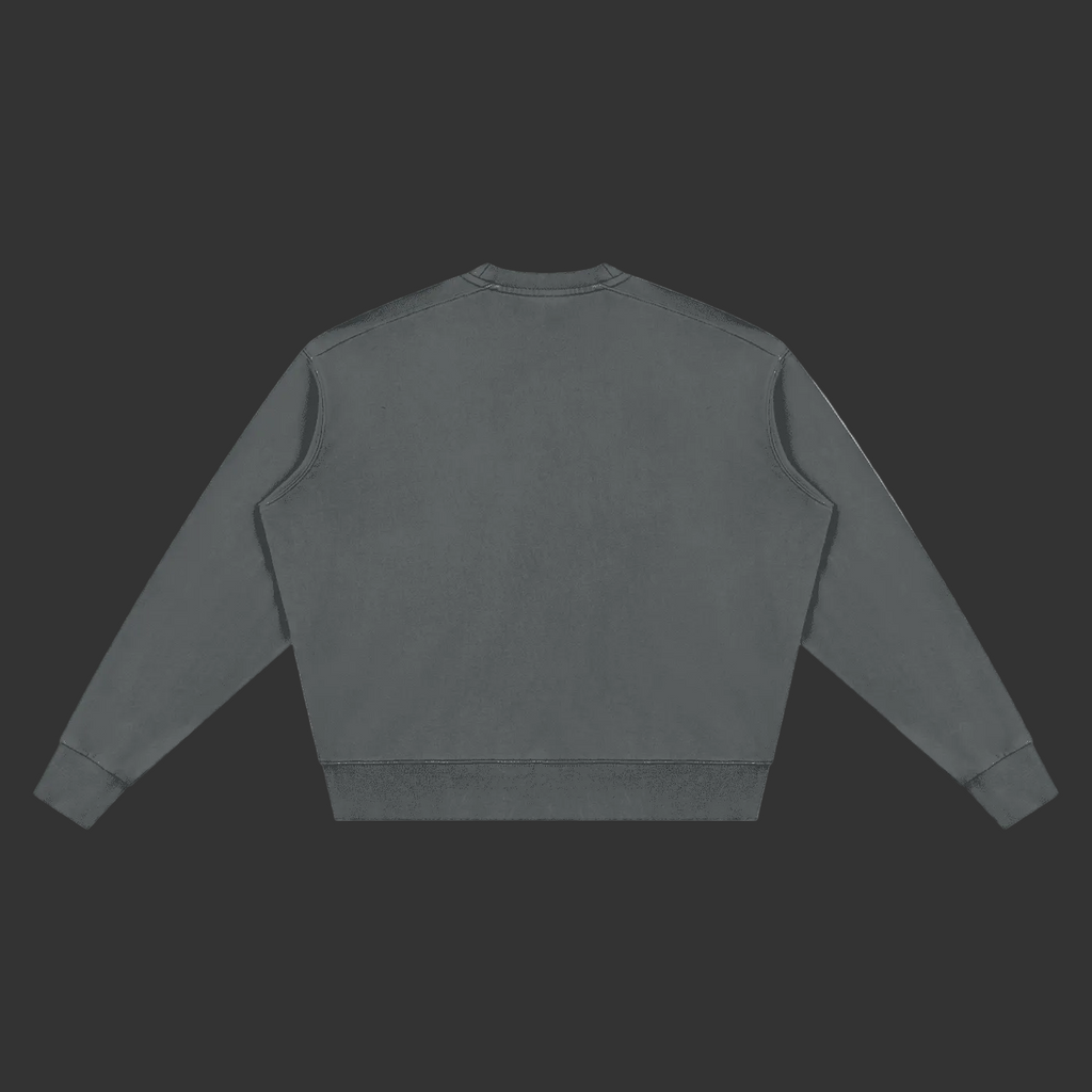 A dark gray crewneck sweatshirt shown from the back, laid flat against a solid gray background.