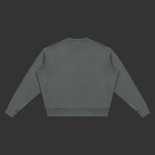 A dark gray crewneck sweatshirt shown from the back, laid flat against a solid gray background.