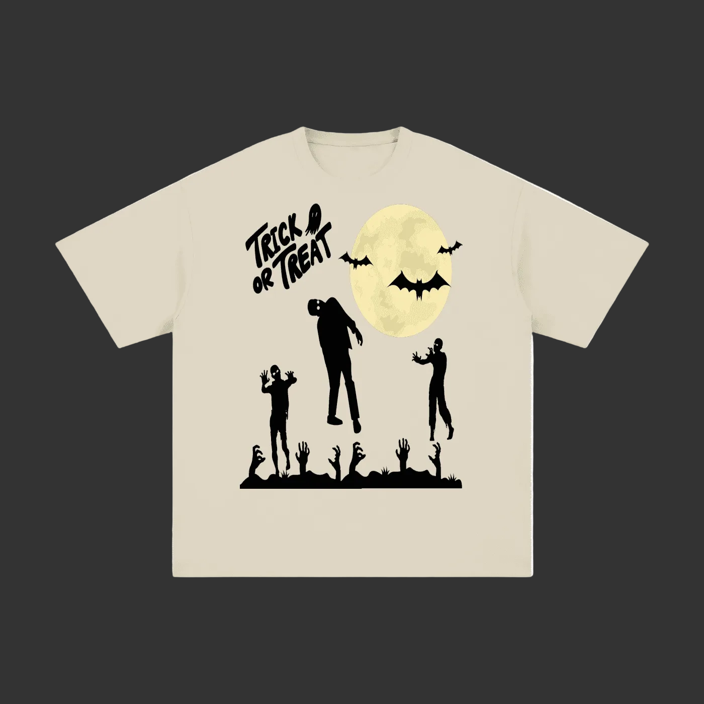 A light beige crewneck t-shirt featuring a black graphic print of zombie silhouettes, bats, and the text 'TRICK OR TREAT' in front of a large yellow moon.