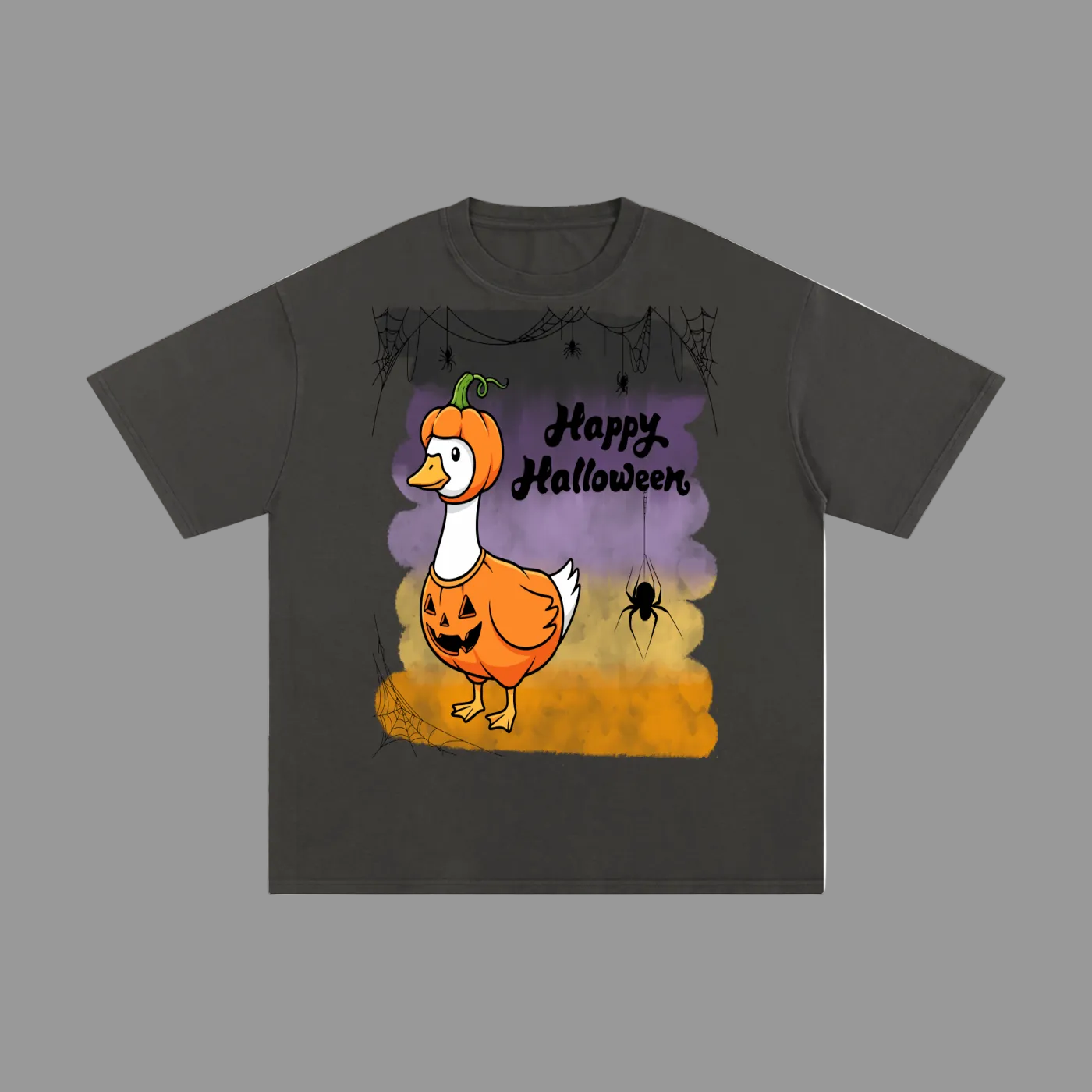 A dark charcoal gray short-sleeve t-shirt with a colorful graphic on the front. The graphic features a cartoon duck dressed as a pumpkin with the text 'Happy Halloween' on a purple and orange background with a spider detail.