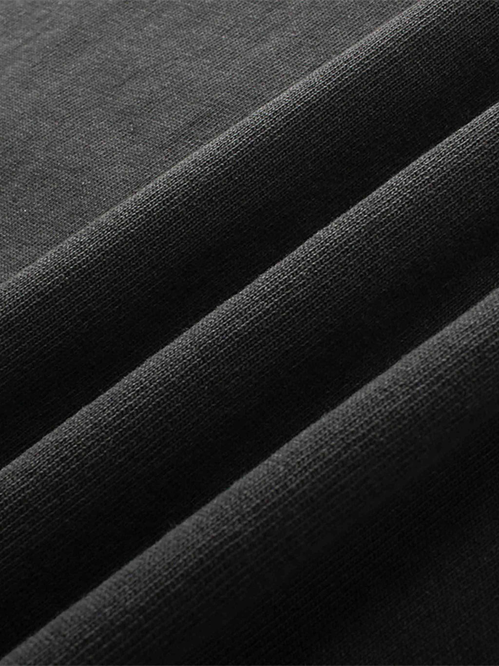 Close-up of black fabric with a textured pattern