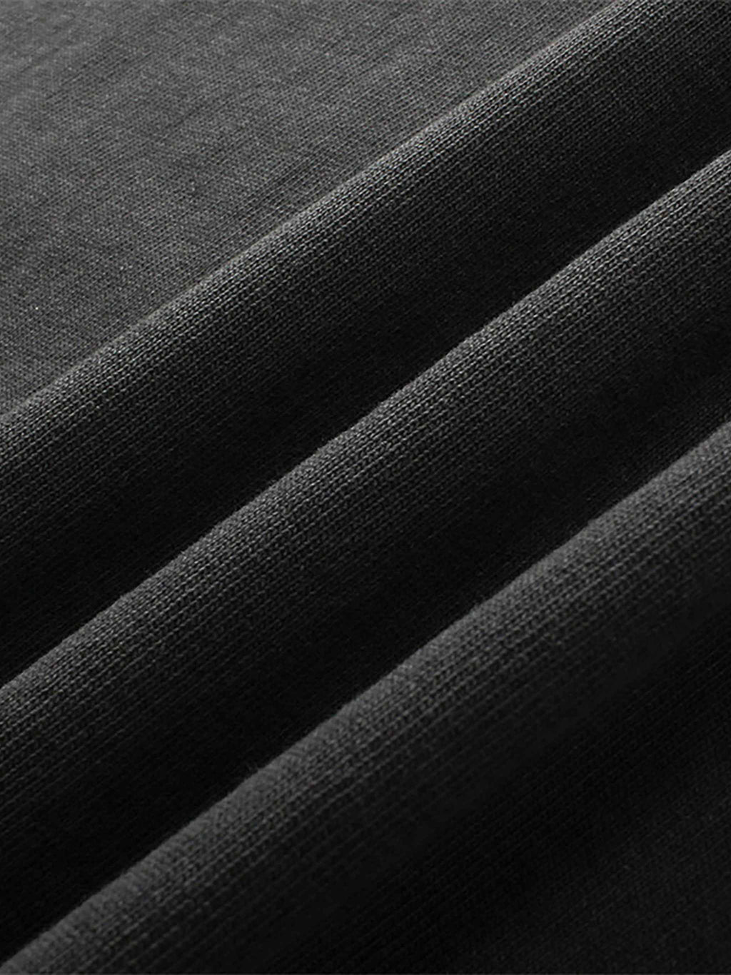 Close-up of black fabric with a textured pattern