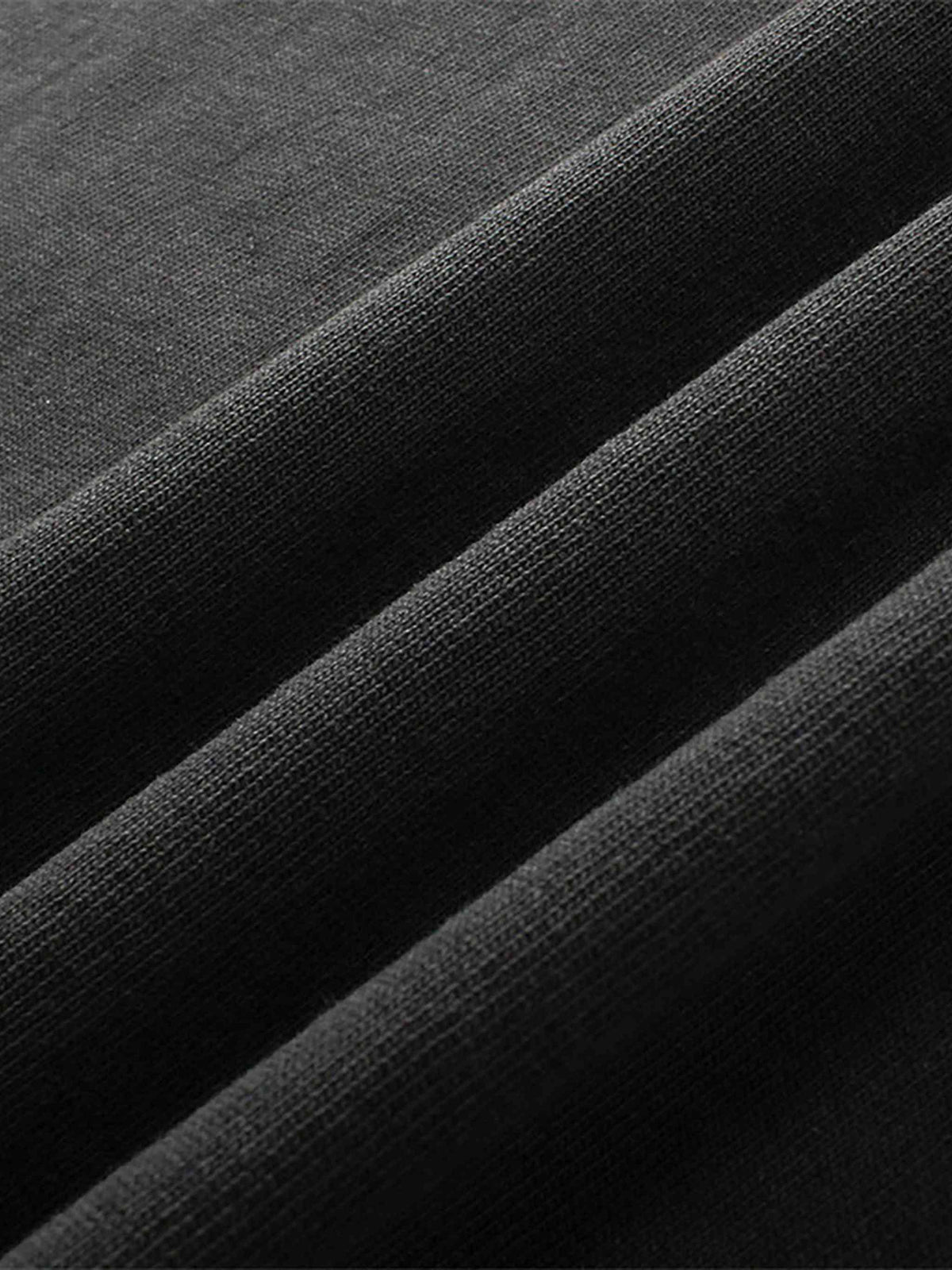 Close-up of black fabric with a textured pattern