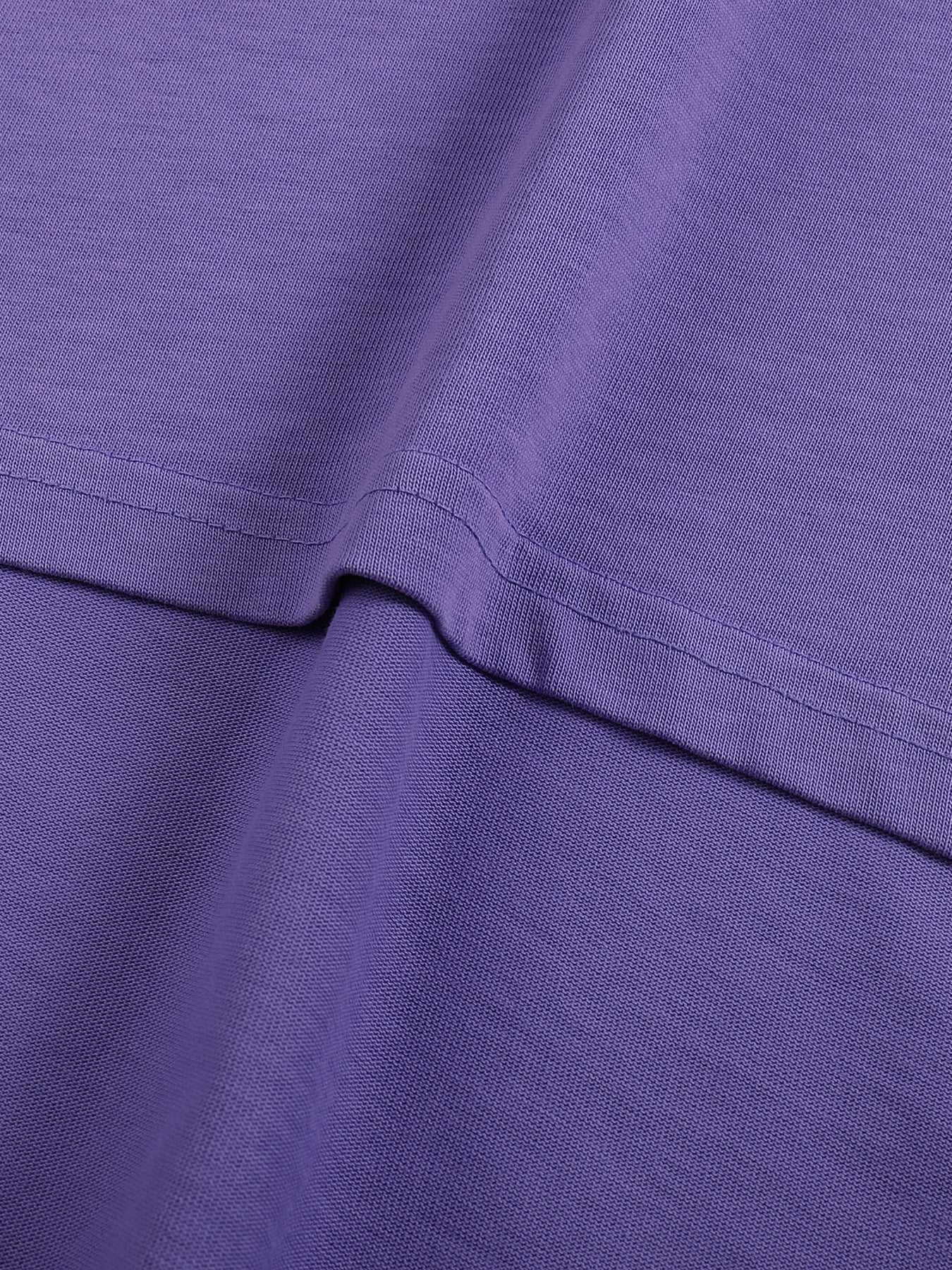 Close-up of a purple fabric texture