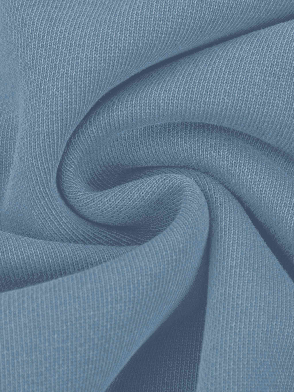 A close-up of light blue ribbed knit fabric, shown with soft folds and a smooth texture.